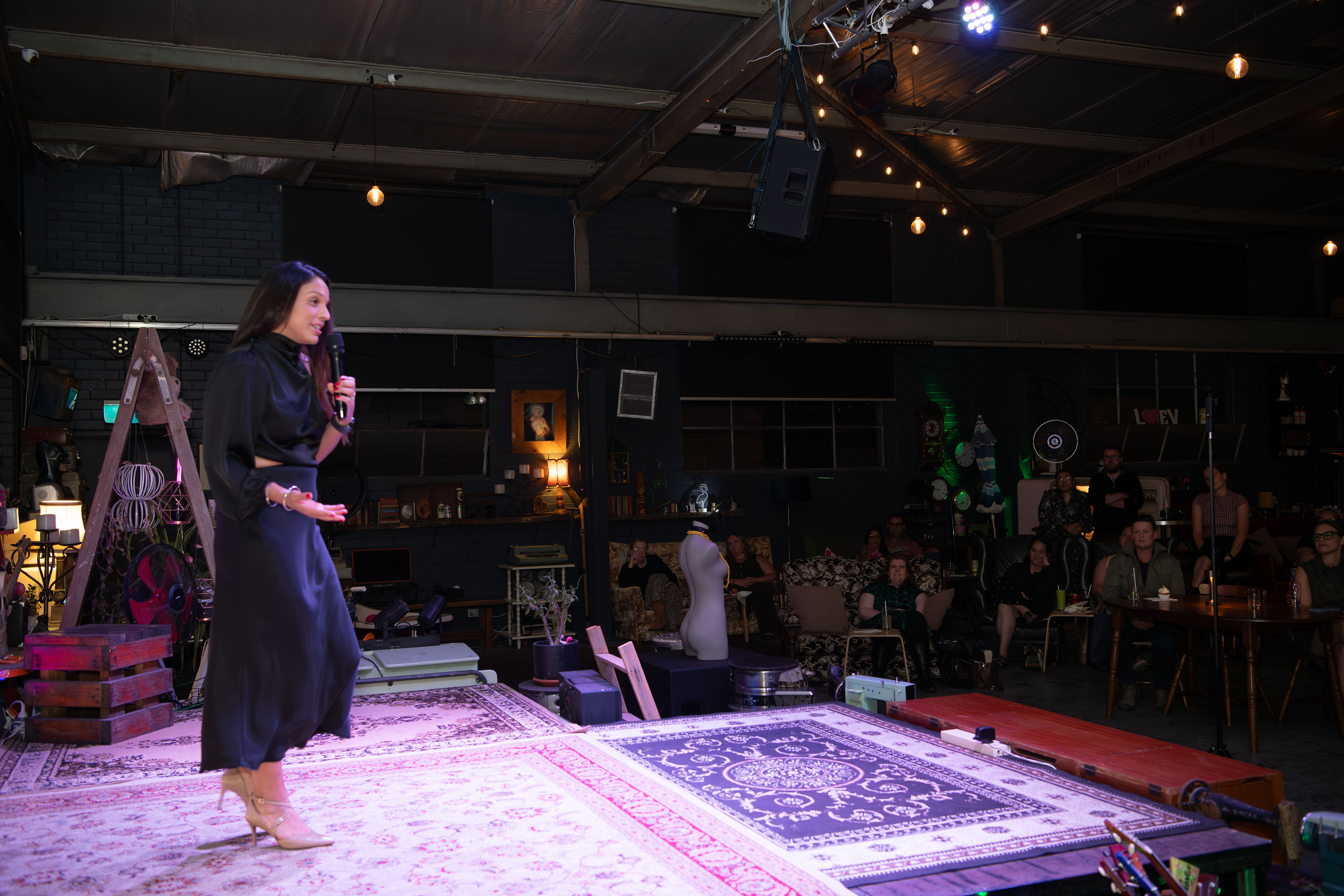 Evelyn speaking on stage